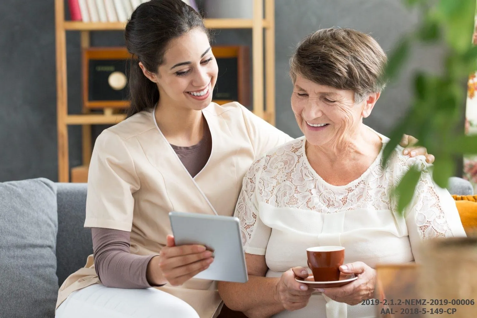 Happy elderly patient and a young female doctor